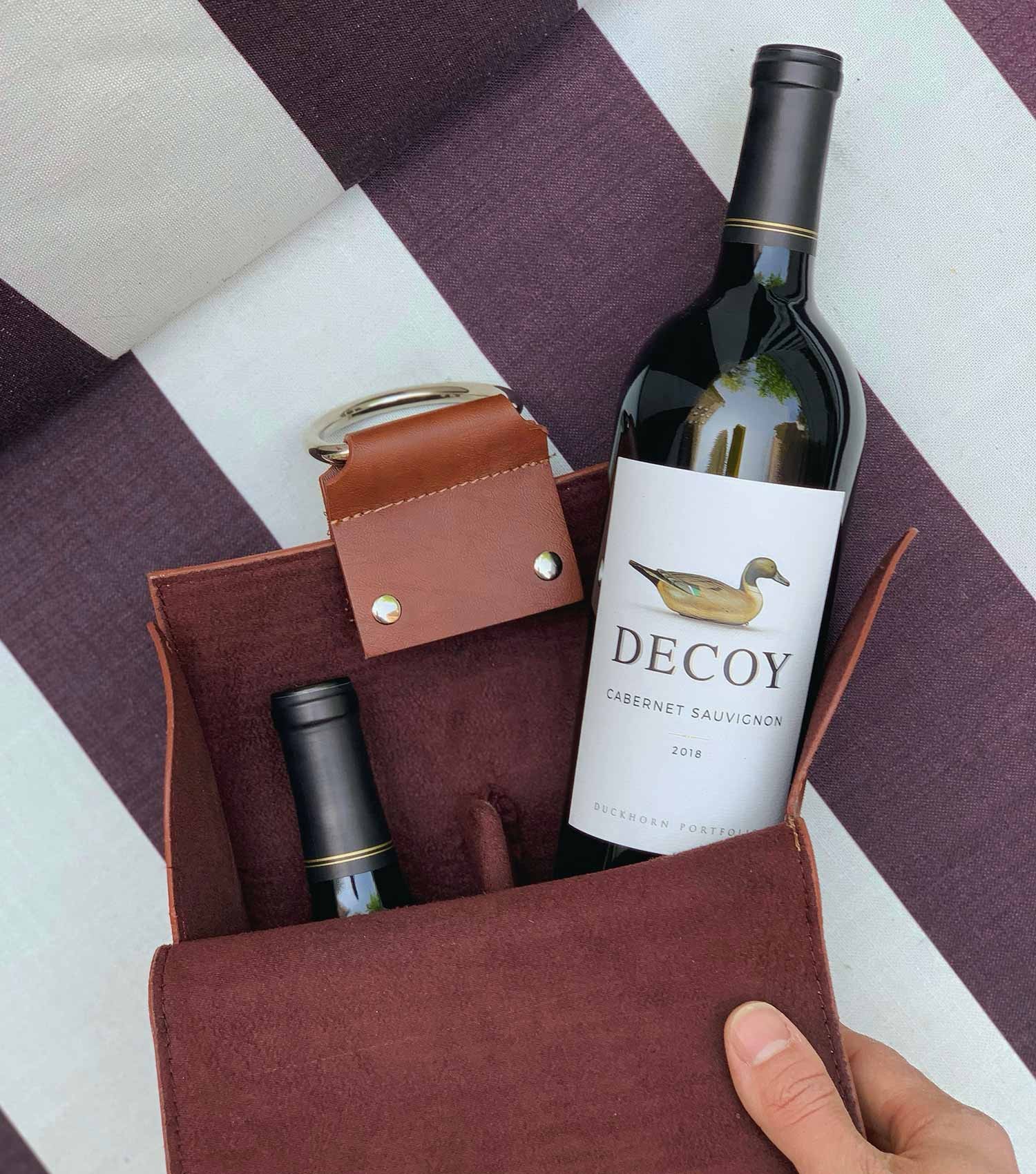 Decoy Cabernet Sauvignon in leather tote