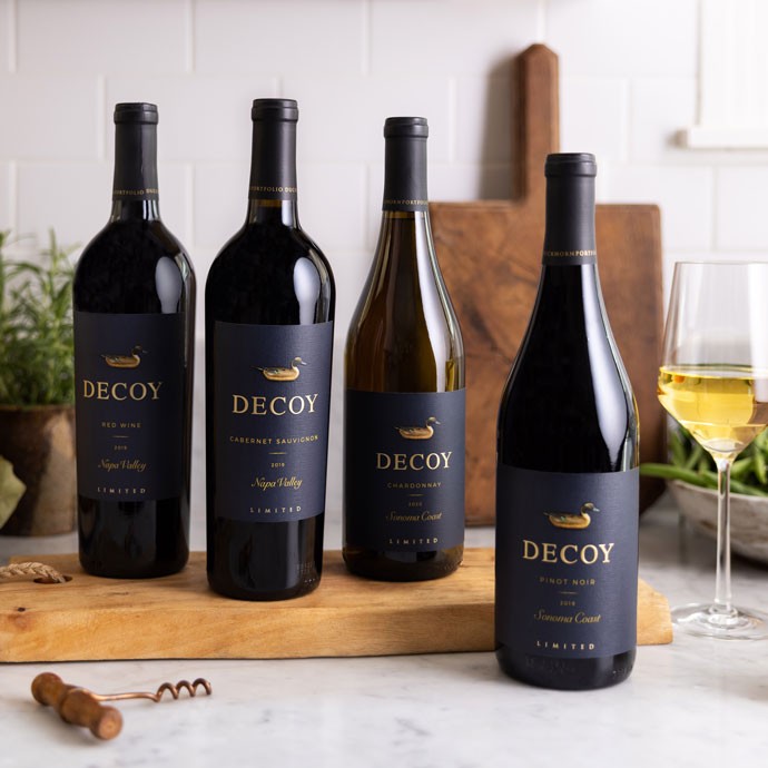 Four bottles of Decoy Limited wine bottles on a kitchen counter