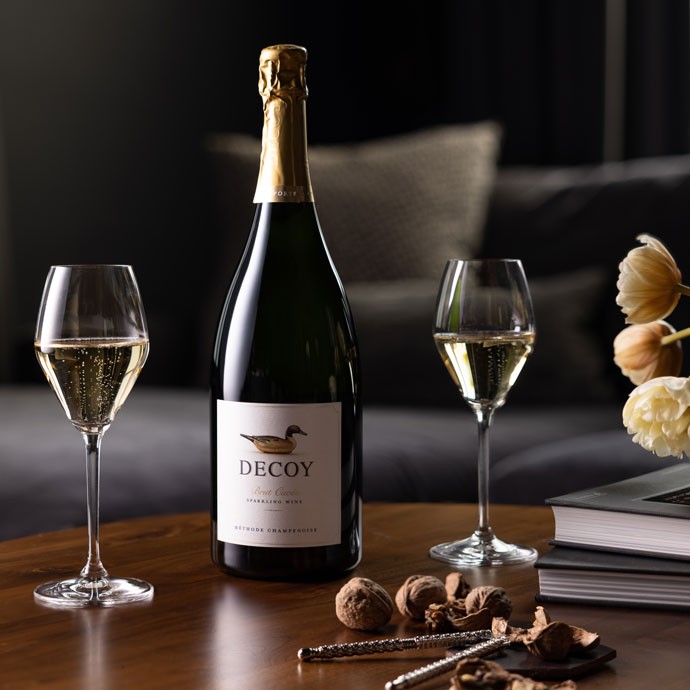 Decoy Sparkling Magnum on a table with two glasses